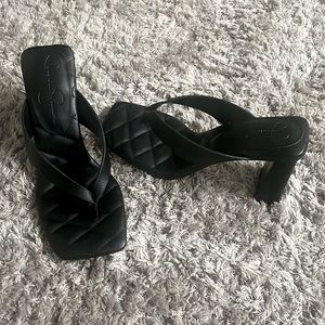 Only worn once! Size 7.5 black thong heels. Trendy and comfortable